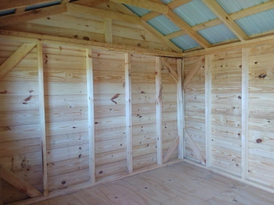 Interior of a log cabin Amish shed