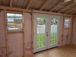 10 x16 Dutch Lap Amish Shed with French Doors and weather wrap - interior front