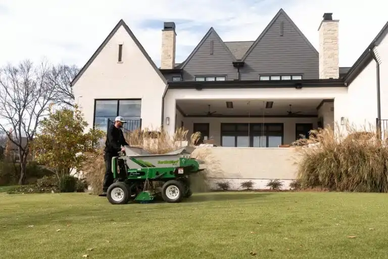415SP Top Dresser Spreader, Aerator and Over-Seeder at work